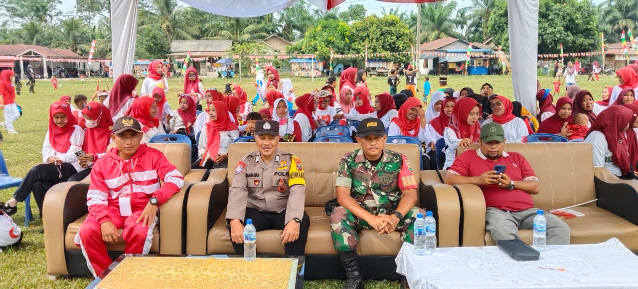 Bhabinkamtibmas Polsek Air Joman Hadiri Perayaan HUT RI ke-80 dan Lakukan Cooling System